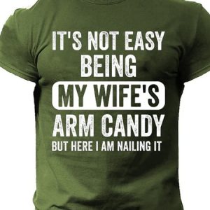 It's Not Easy Being My Wife's Arm Candy But Here I Am Nailing It, T-shirts, Lilicloth.com