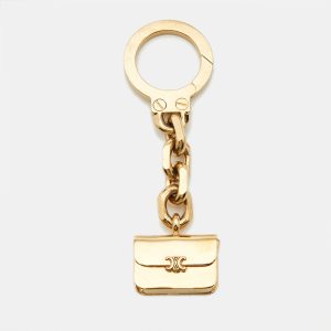 Celine Gold Tone Metal Triomphe Bag Charm, Luggage Accessories - Luxury Closet catalog