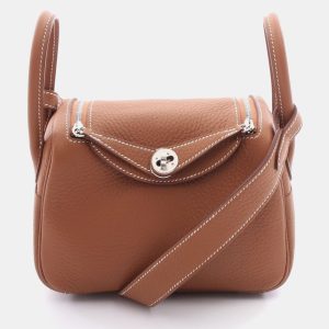 Hermes Lindy Mini Gold Taurillon Clemence Leather Shoulder Bag, Handbags - Luxury Closet catalog