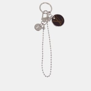 Louis Vuitton SIlver Plated Bag Charm, Luggage Accessories - Luxury Closet catalog