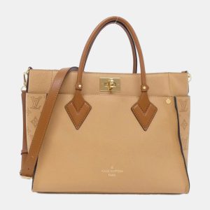 Louis Vuitton Leather Mahina On My Side MM Handbag, Tote Handbags - Luxury Closet catalog