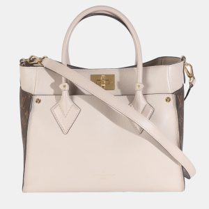 Louis Vuitton Greige Calfskin Monogram On My Side MM bag, Tote Handbags - Luxury Closet catalog