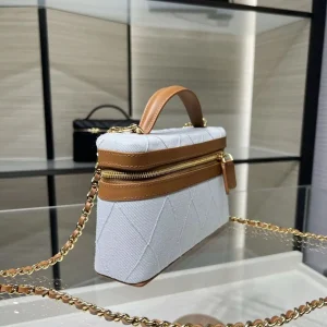 Light blue quilted fabric handbag with tan leather trim, short top handles, and a rectangular crossbody shape with a leather-woven gold chain strap. - AliExpress Women's Handbags